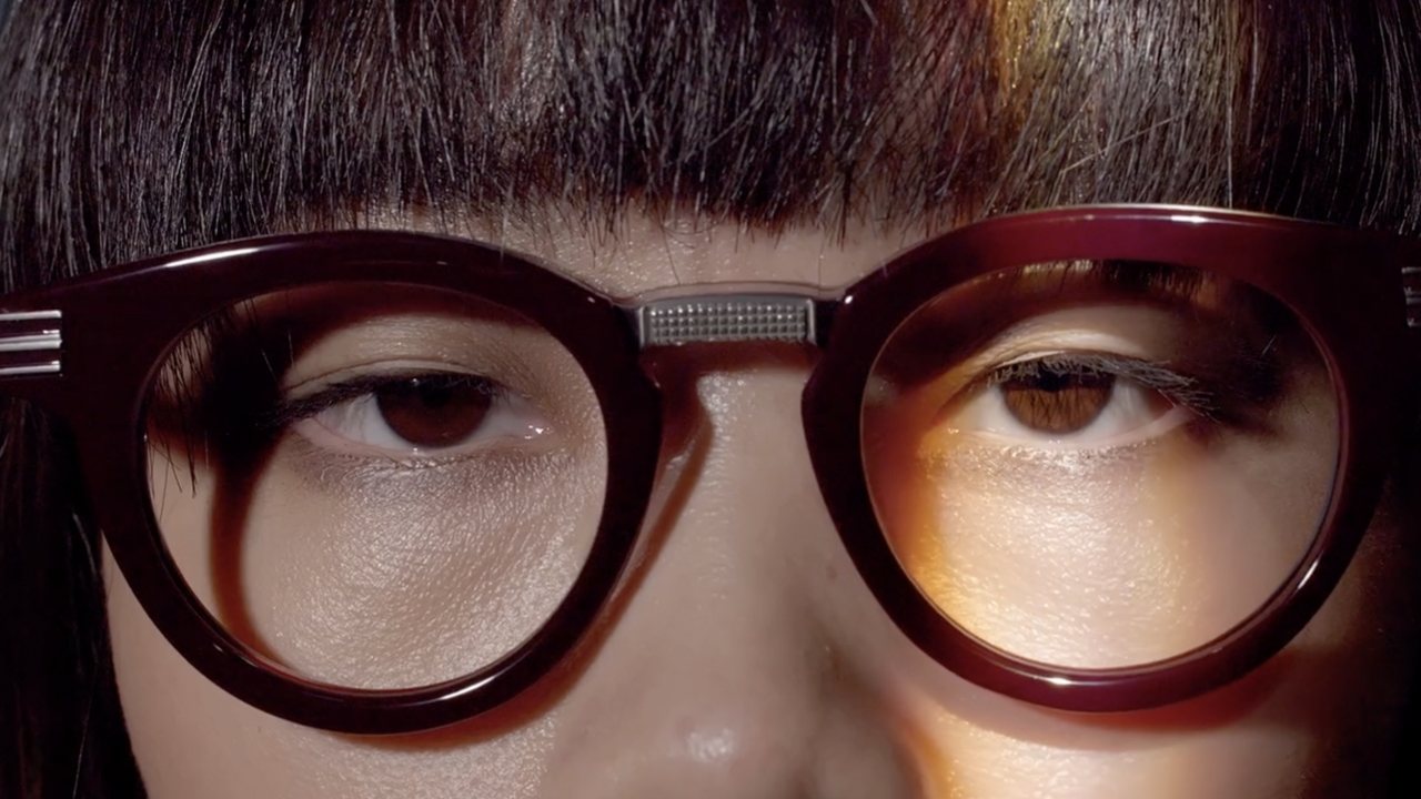 Masunaga, Masters of Craft: extreme close-up through dark red frames