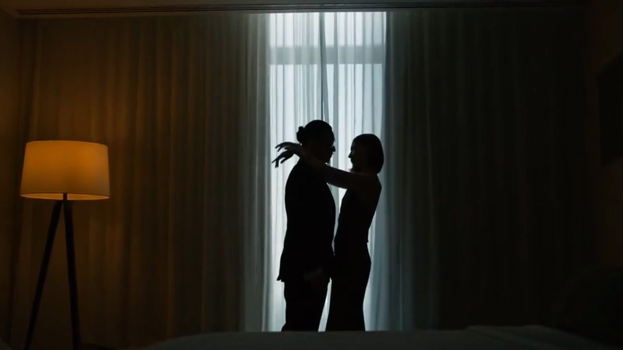 MGM, Make a Scene: a couple in silhouette embracing against sheer curtains in a lamp-lit hotel room