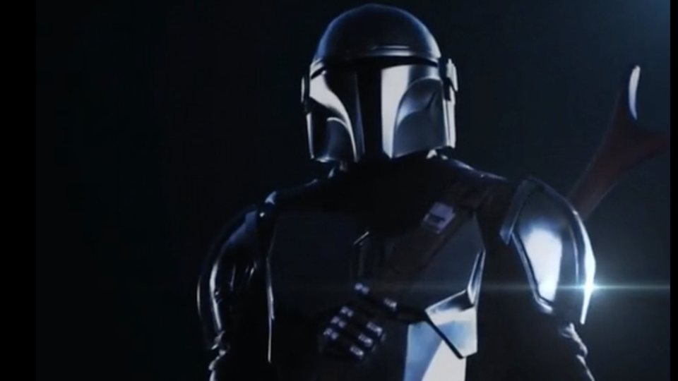 The Mandalorian promo: armored figure edge-lit against black